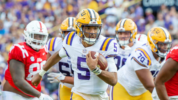 LSU quarterback Jayden Daniels helped push the Tigers past Ole Miss last season.